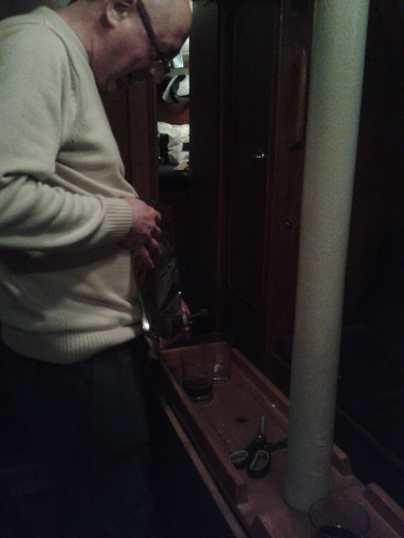 The bar steward makes sure every drop is extracted from the wine box